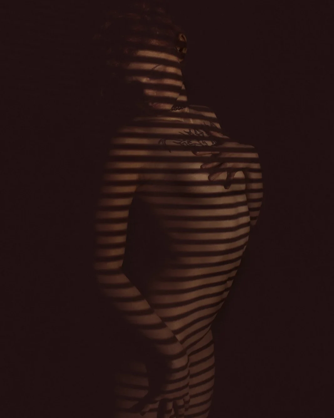 Portrait by Greek photographer Nikos Latsios featuring a woman illuminated by warm window light.